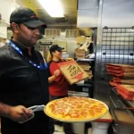 who owns angelo's pizza and restaurant in harvard illinois 2024